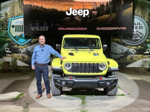 Morrison poses with 2024 Gladiator at NAIAS 2023