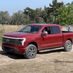 2022 Ford F-150 Lightning - muddy on trail
