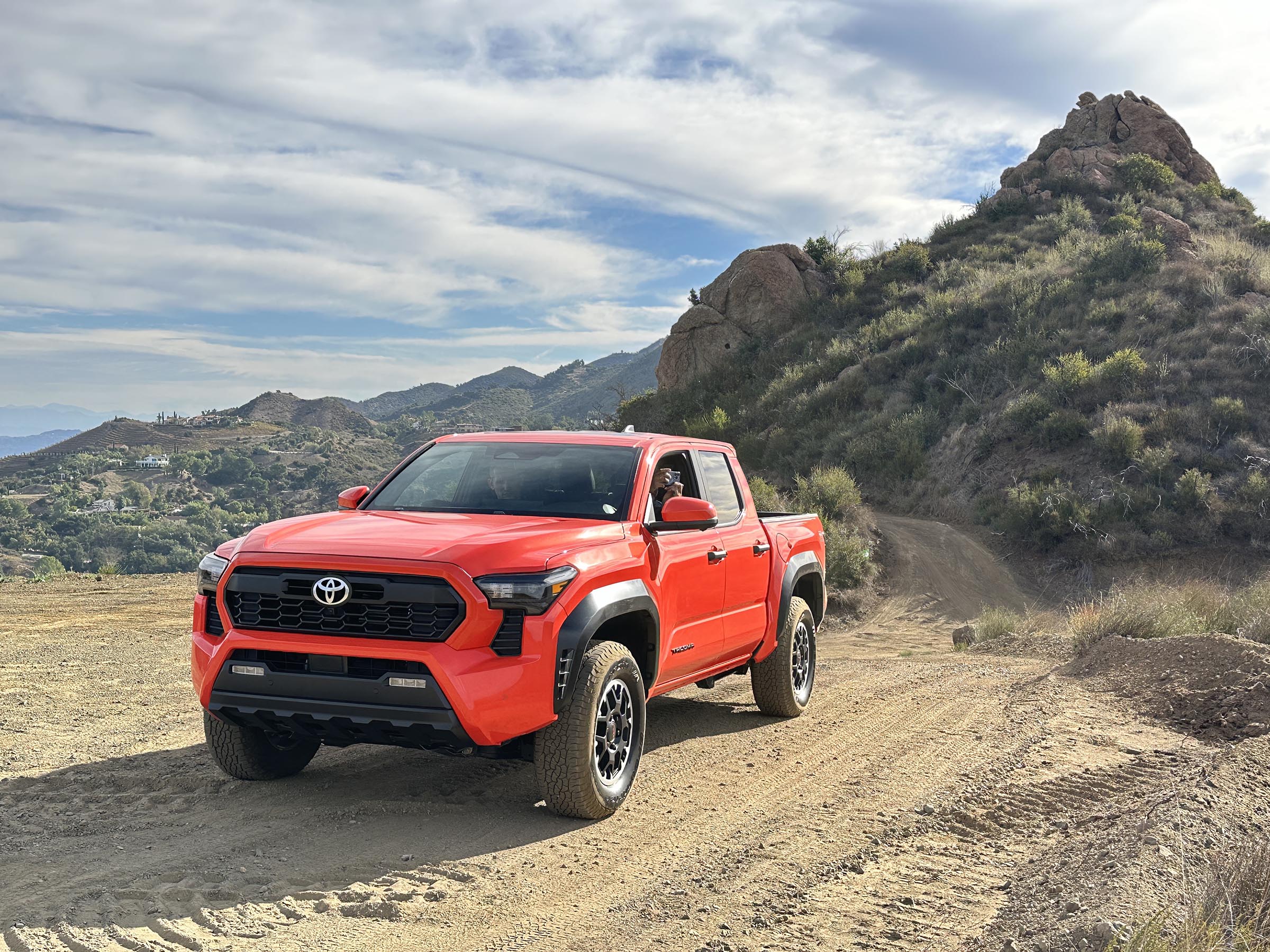 2024 Toyota Tacoma TRD - driving by hill