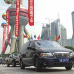 A Buick drives through Shanghai
