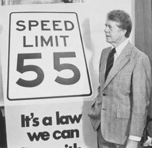 Jimmy Carter and 55 sign