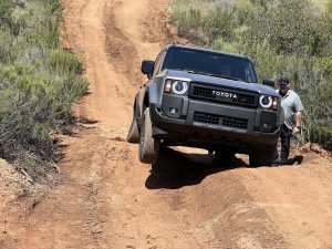2024 Toyota Land Cruiser - tire up on mogul