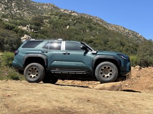 2025 Toyota 4Runner Trailhunter - side on rock