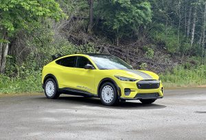 2024 Ford Mustang Mach-E Rally - yellow front 3-4 beauty shot