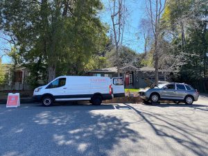 Curbee service van with Porsche