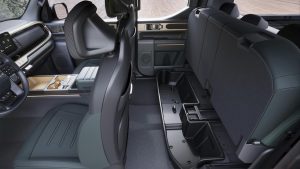 Kia Tasman - interior with underseat storage