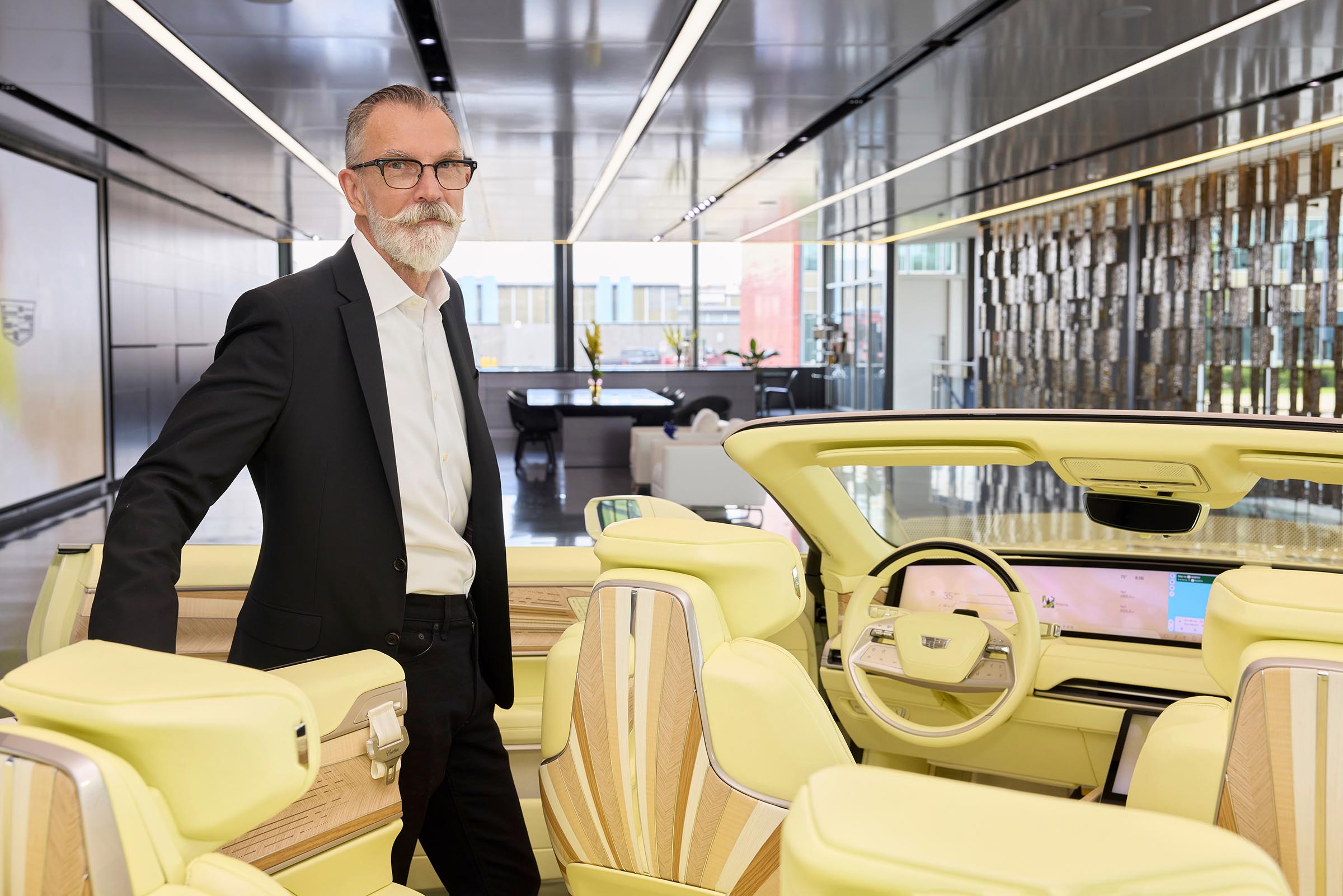 Michael Simcoe, senior vice president, Global Design, pictured alongside the interior of SOLLEI concept vehicle.