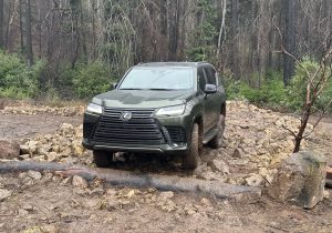 2025 Lexus LX 700 h - off-road log and rocks