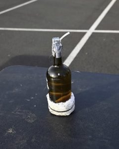 Tesla Dealership - Salem OR - Molotov cocktail - court evidence