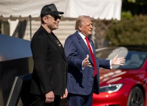 Trump and Elon with Teslas