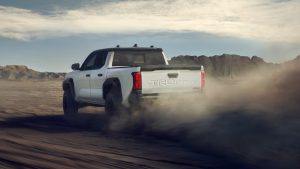 2025 Toyota TRD Pro driving rear