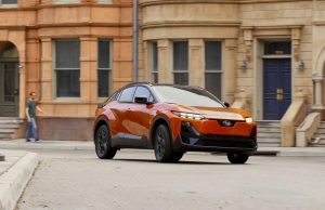 Subaru Uncharted - front 3-4 driving in city REL-V