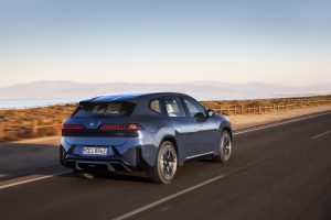 BMW iX3 - rear 3-4 driving