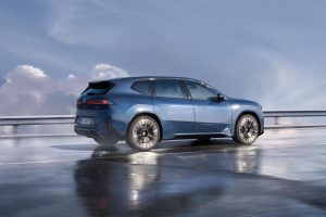 BMW iX3 - side w clouds<L