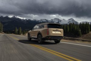 2027 Kia Telluride X-Pro - driving rear 3-4