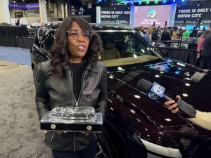 Hyundai SVP Olabisi Boyle with Nactoy trophy