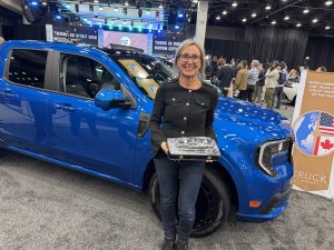 Pam Wylie, Ford vehicle line program director with Nactoy trophy