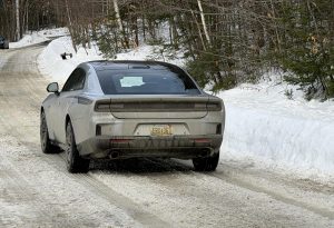2026 Dodge Charger RT - Sedan rear 3-4 on back road