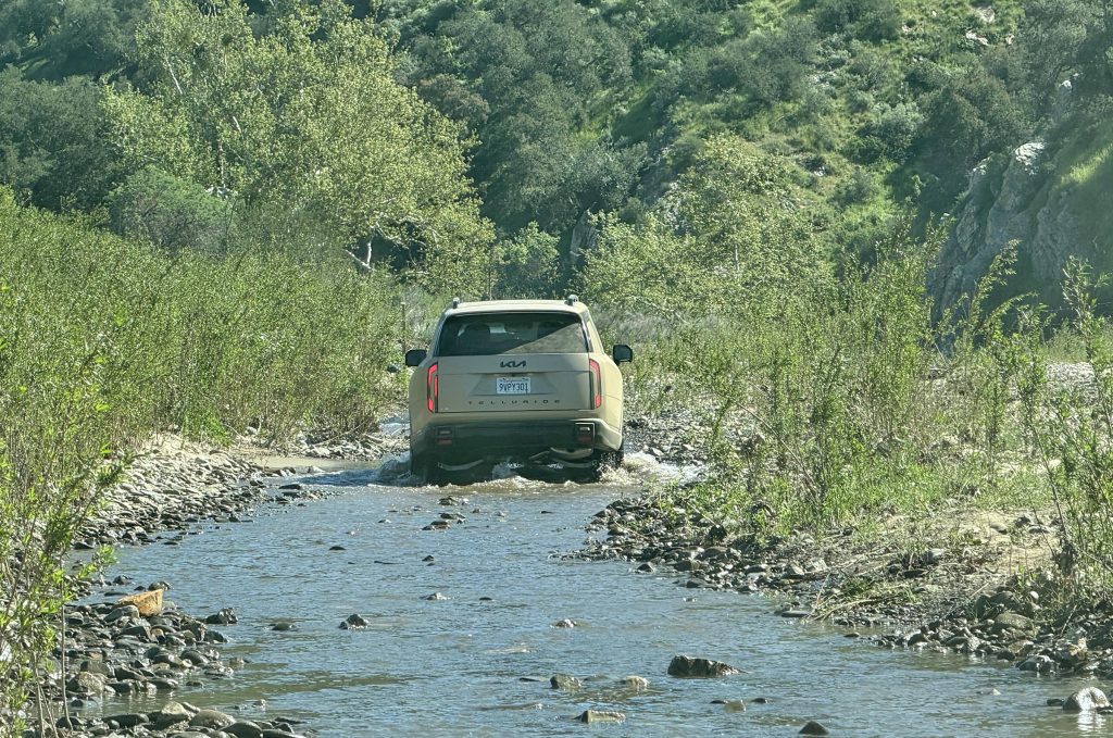 2027 Kia Telluride X-Pro - rear in creek
