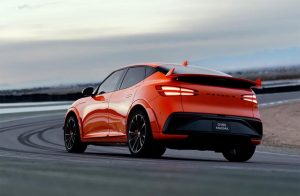 Genesis GV60 Magma - rear 3-4 on track