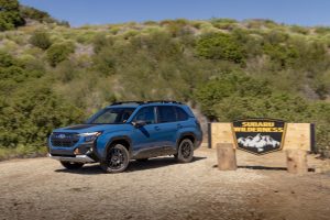 2027 Subaru Forester Wilderness hybrid blue with sign