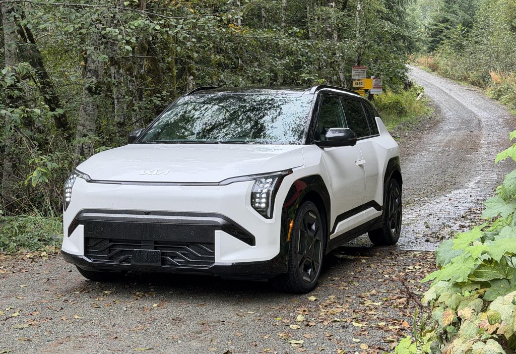 2027 Kia EV3 - front 3-4 in woods