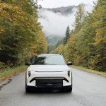 2027 Kia EV3 - front driving hero shot w clouds